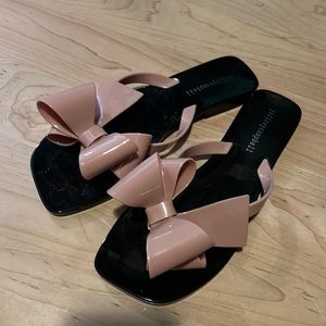 Jeffrey Campbell black and nude/blush bow slides
